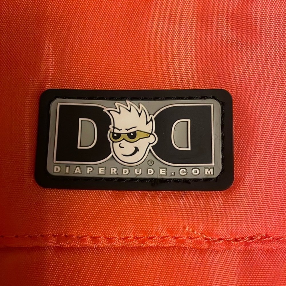 DIAPER DUDE:NWT,Great for new dads! Has waterproof blanket, storage, and strap.